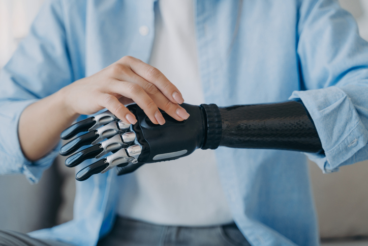 Pneumatic Exoskeleton with Adjustable Stiffness Facilitates Both Overhead and Forward Arm Tasks
