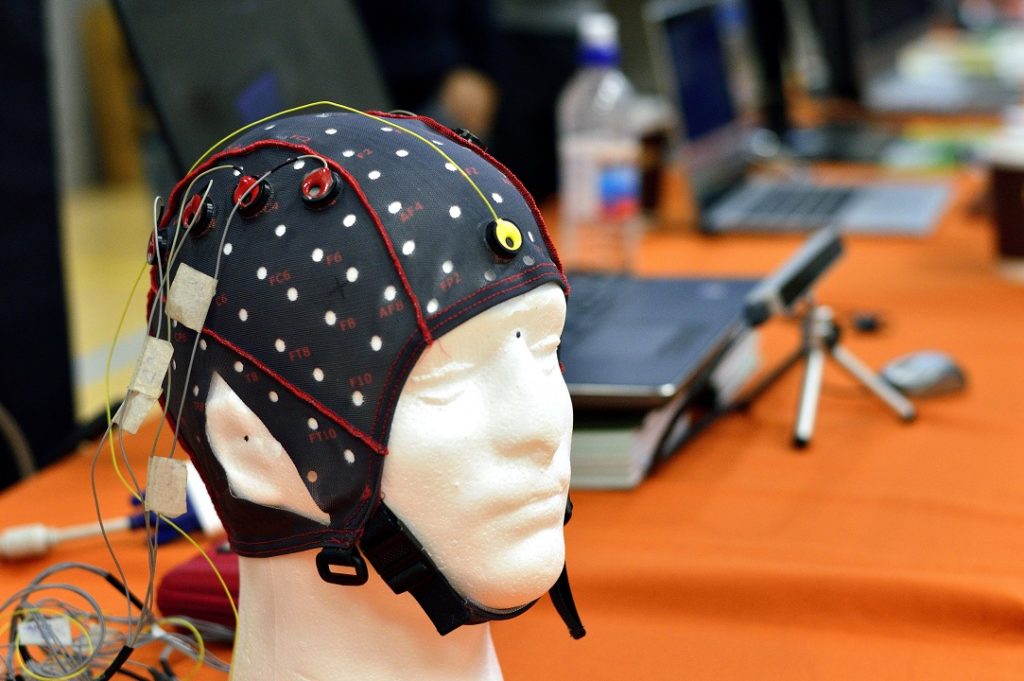 REINVENT: Leveraging Virtual Reality and Neurofeedback to Help With Motor Rehabilitation
